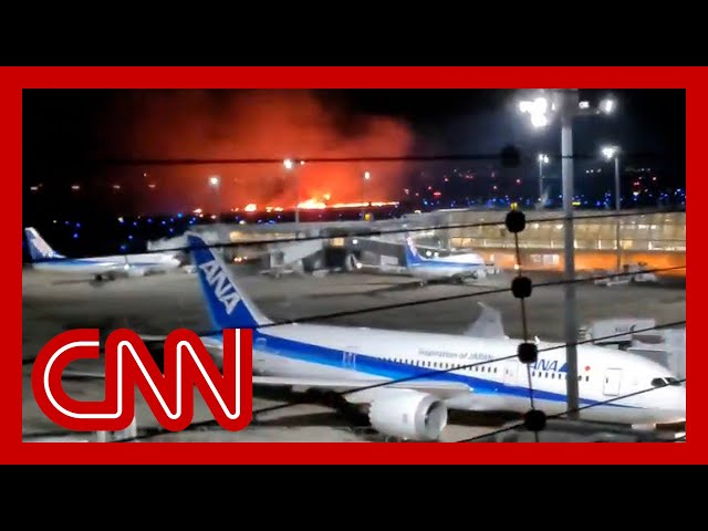 See moment planes collide at Tokyo airport