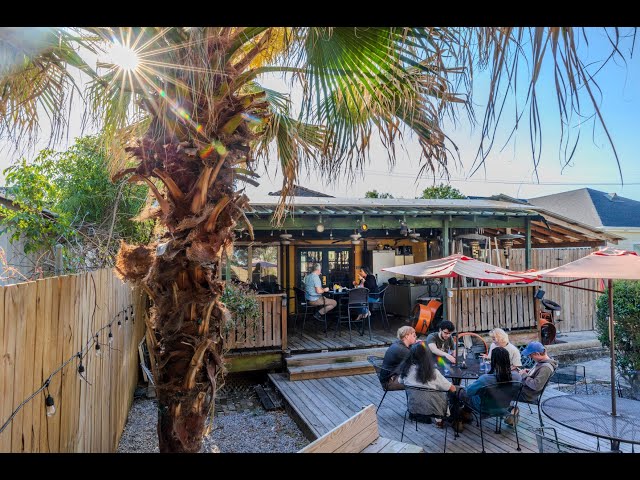 Eating with Ian at a New Orleans restaurant with Jamaican Creole Fusion and a hidden patio