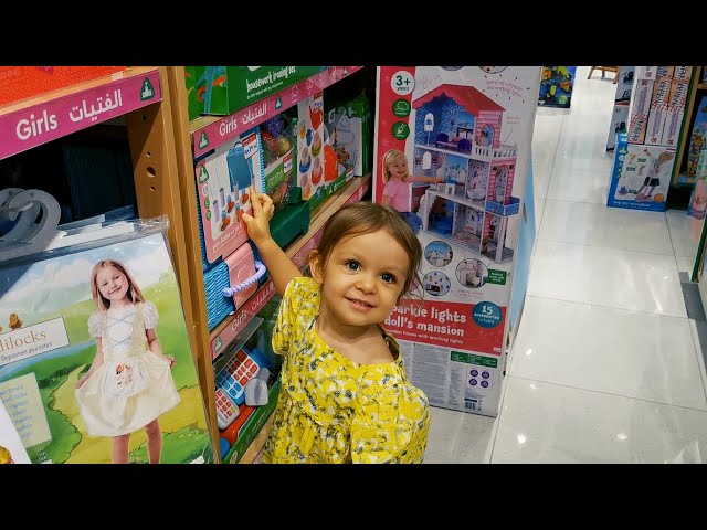 Little Mia is shopping at Toys Store. Fun children video