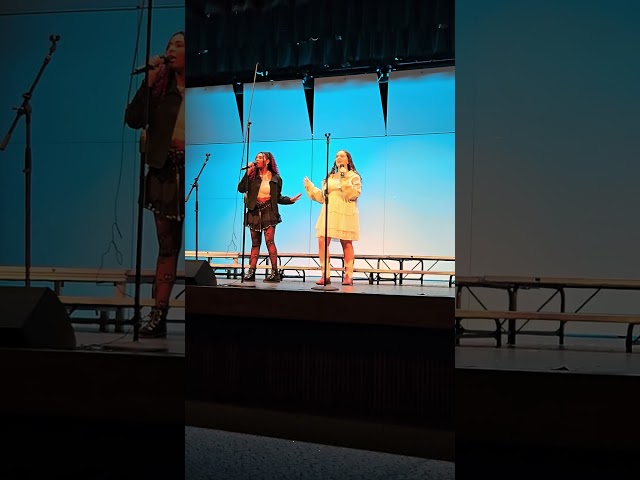 Madison singing in her duet