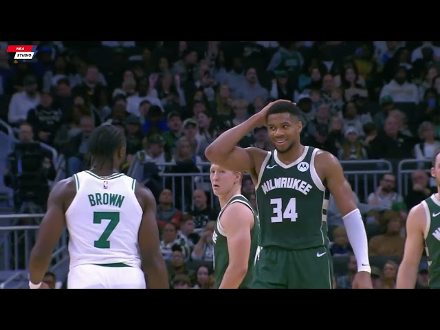 Giannis Antetokounmpo elbows Jaylen Brown in the head and after that trolls him with fake handshake.