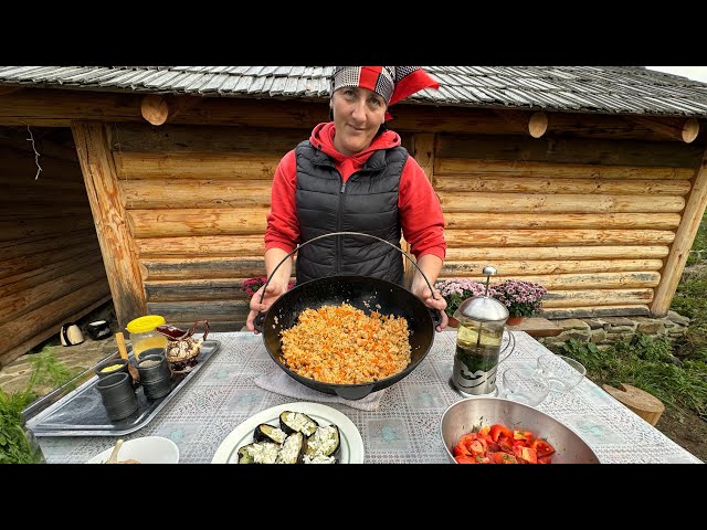 Highlanders prepare dinner in the village in the fresh air high in the mountains of Ukraine!