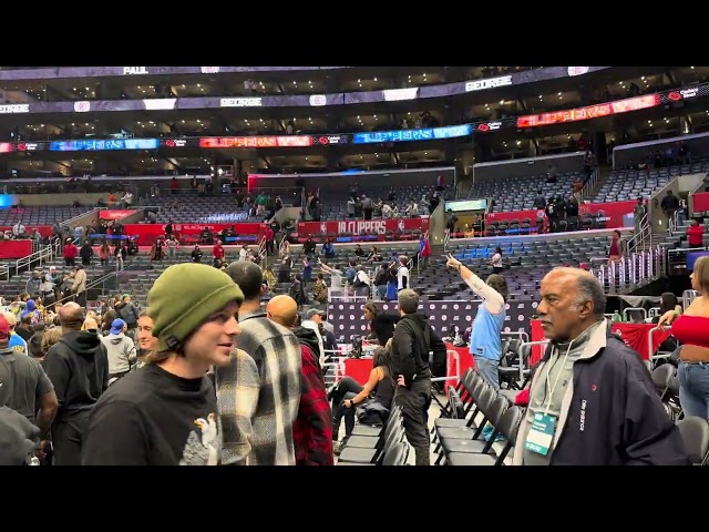 Paul George throwing game ball to clippers fans after the game