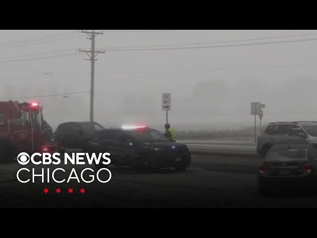 Accumulating snow causing slick road conditions in the Chicago area