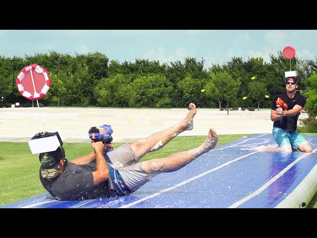 Nerf Slip and Slide Battle | Dude Perfect