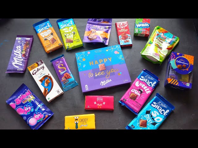 100 candies opening, chocolate a video, lots of chocolates, Cadbury celebration, surprise toys