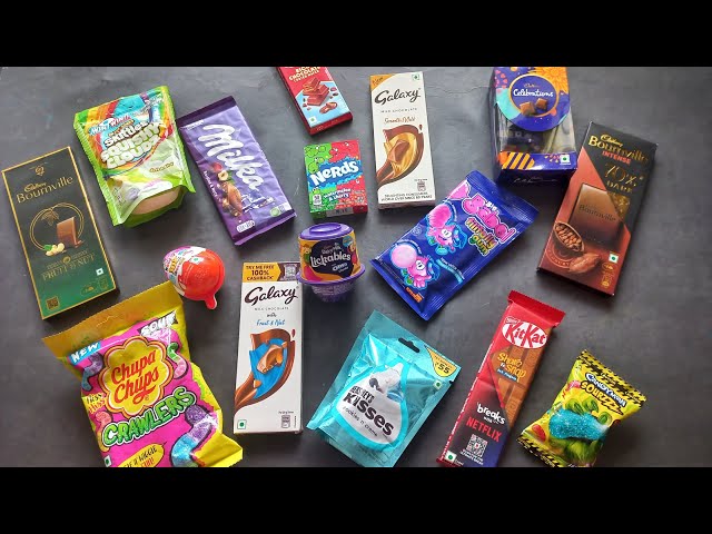 100 candies opening, chocolate a video, lots of chocolates, Cadbury celebration, surprise toys