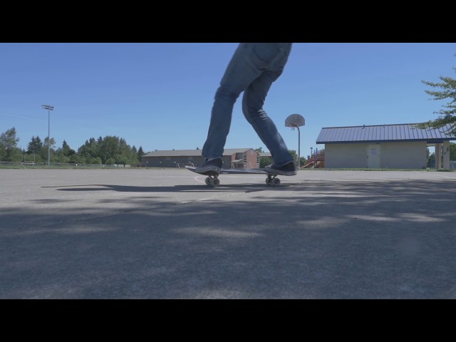 Slowmotion 180 Degree Spin on a Skateboard