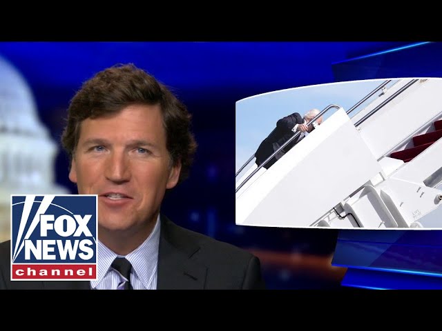 Tucker reacts to Biden's public fall up Air Force 1 stairs