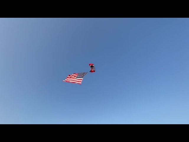 Sergeant first class Dana Bowman goes skydiving to deliver game ball