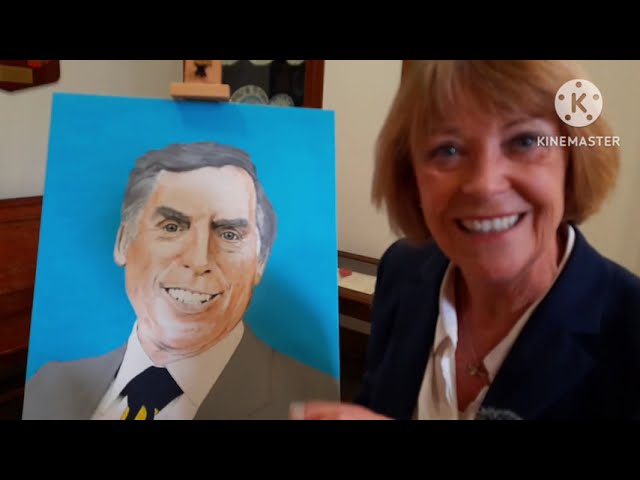 Isla St Clair with the portrait of Larry Grayson