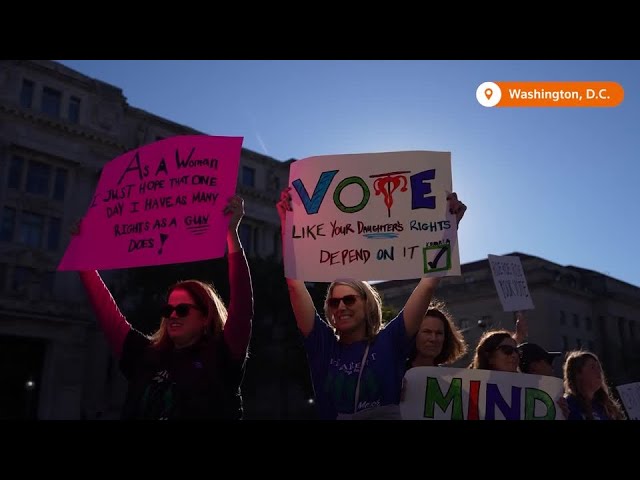 Thousands rally for women's rights before US presidential election | REUTERS