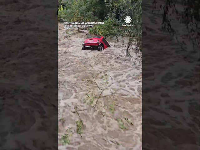 Mini Cooper Bobs Downstream During France Flooding