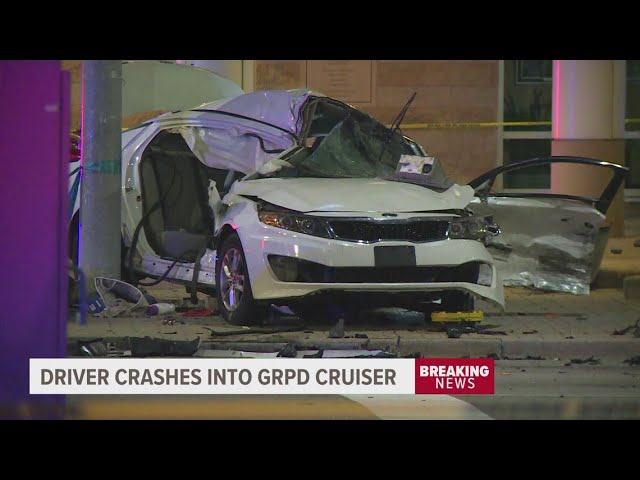 Minor injuries reported after suspected stolen vehicle crashes into Grand Rapids officer overnight