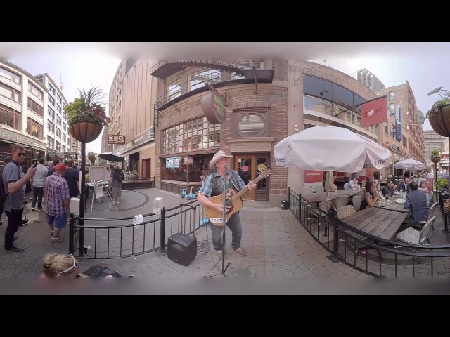 Outside, with a country singer who writes ballads for Trump