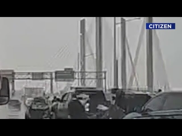 One dead after car nearly flips over NYC bridge