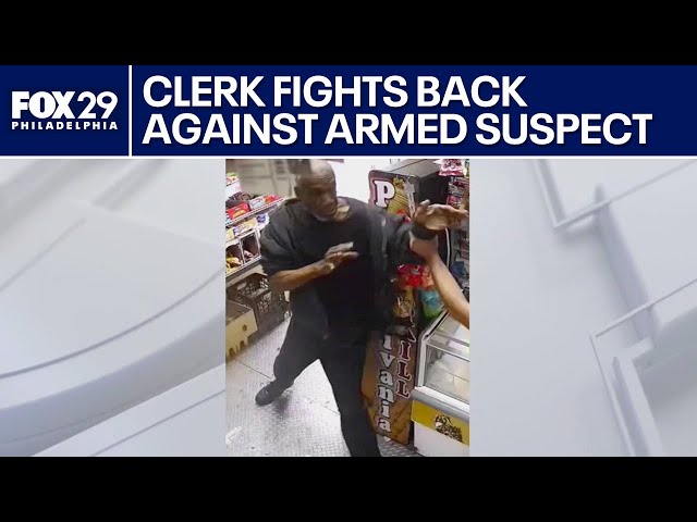 WATCH: Brave store clerk fights back against armed robbery suspect