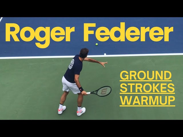 Roger Federer warms up groundstrokes for practice