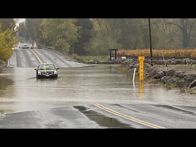 Car stuck on flooded Sonoma County road after driver ignores warning signs