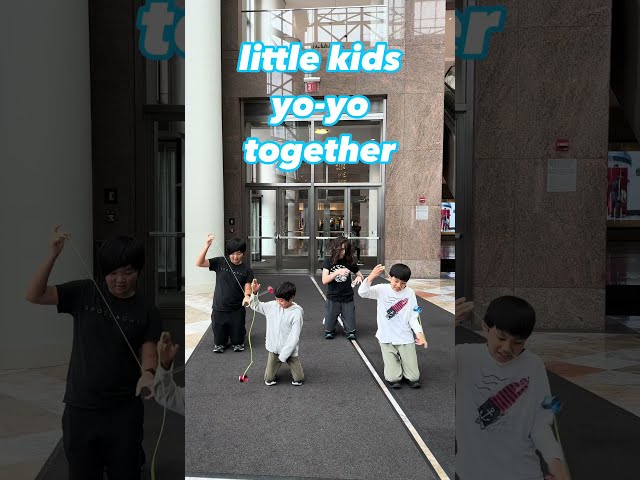 Little kids yoyo together at the New York Yo-Yo Club