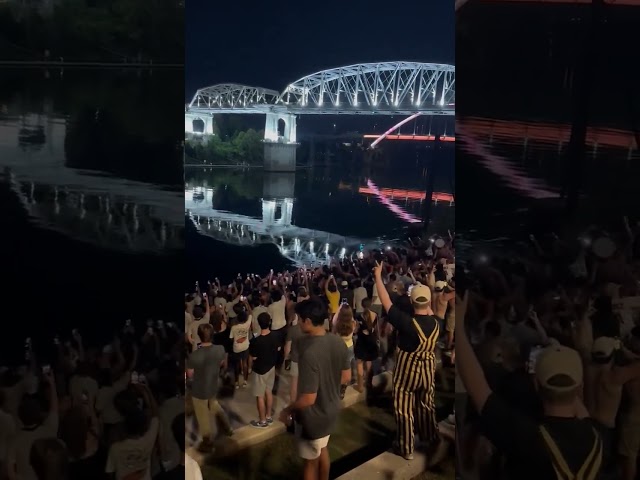 Vanderbilt fans throw the goalpost into the Cumberland River after beating Alabama