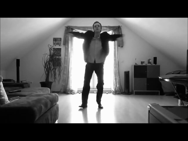 Young man is dancing/Молодой человек танцует