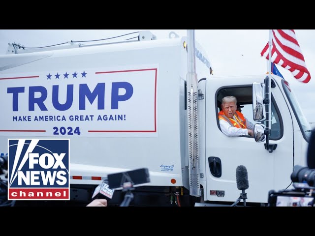 Trump STUNS in sanitation outfit while giving presser from garbage truck