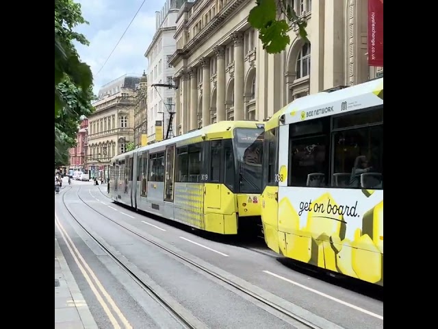 Manchester Trams, 3038/3019 Cross St. City. Royal Exchange Background