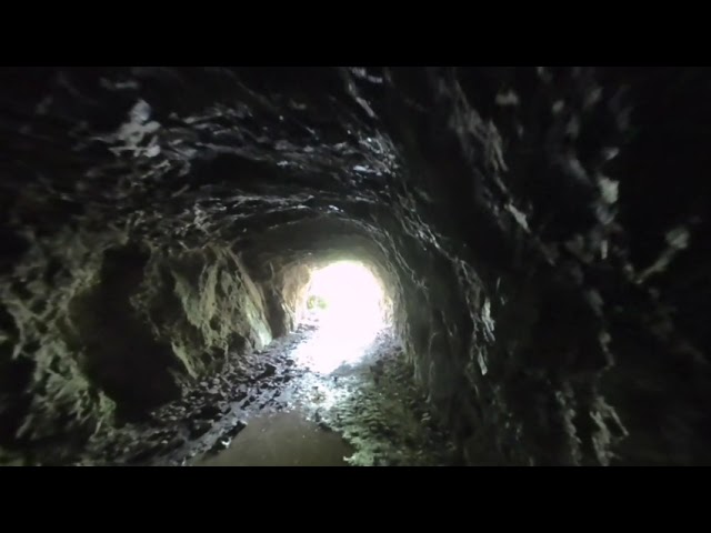 Walk Through a Tunnel to a Mine