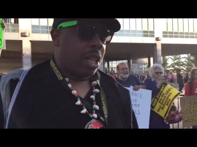 Protester speaks to newsnet5.com about immigration outside GOP debate in Cleveland