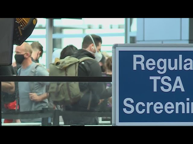 Rental cars, travelers wrap around Austin airport Monday morning