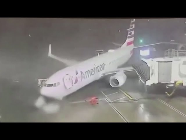 Strong winds shift plane at DFW Airport