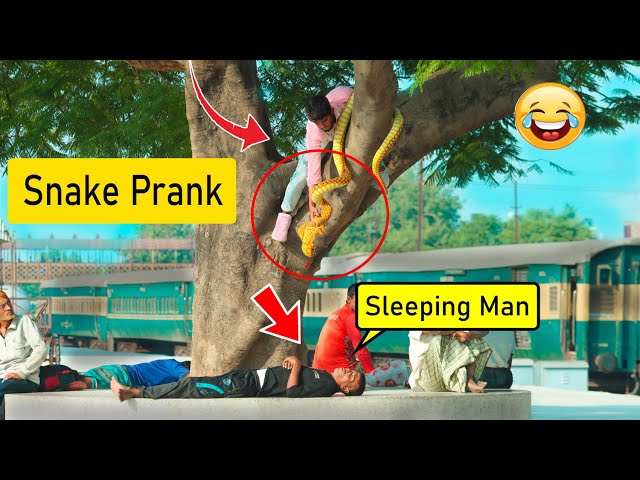 MAD GUY SNAKE PRANK on Sleeping Man🐍Fake Snake Prank Video on Public..