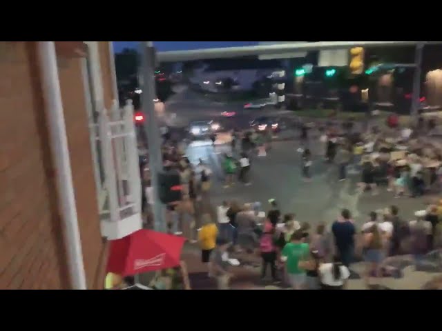 Car drives through protesters in Iowa City