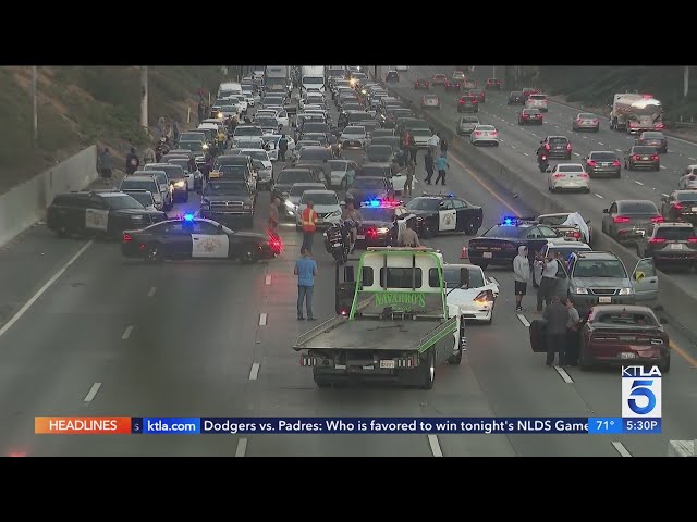 Police search for two suspects wanted in Los Angeles fatal road rage shooting