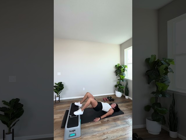 feet elevated glute bridge pulse