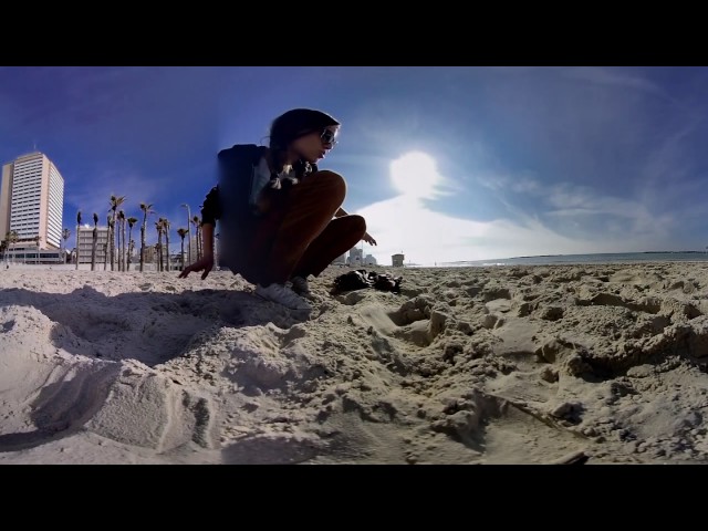 Catch some sun with Reny on the beach of Tel aviv