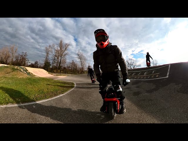 Four riders on BMX track