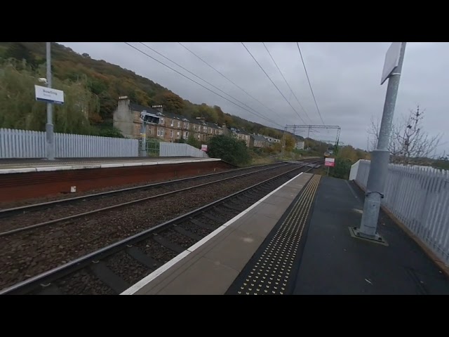 Electric train passes Bowling on 2022/10/30 at 1611 in VR180