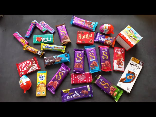 100 candies opening, chocolate a video, lots of chocolates, Cadbury celebration, surprise toys