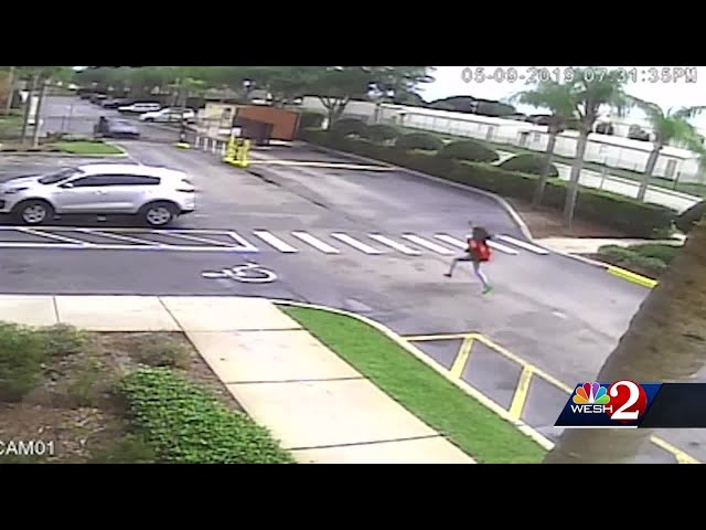 Video shows vehicle following young girl as she screams and runs for help: 'It's just shocking'