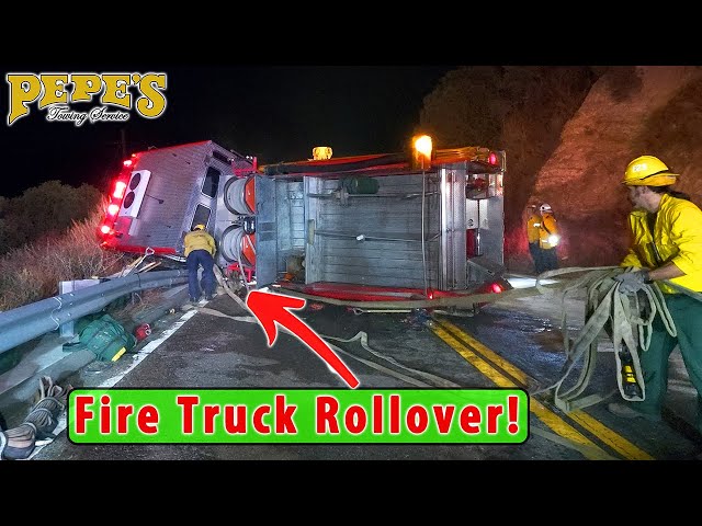 Fire Truck Crashes Into Guard Rail and Flips Over