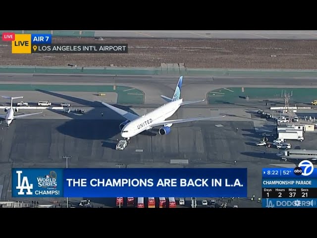 Dodgers arrive in LA as World Series champions!