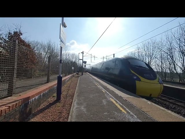 Pendolino passing Carluke on 2022/03/28 at 1159 in VR180