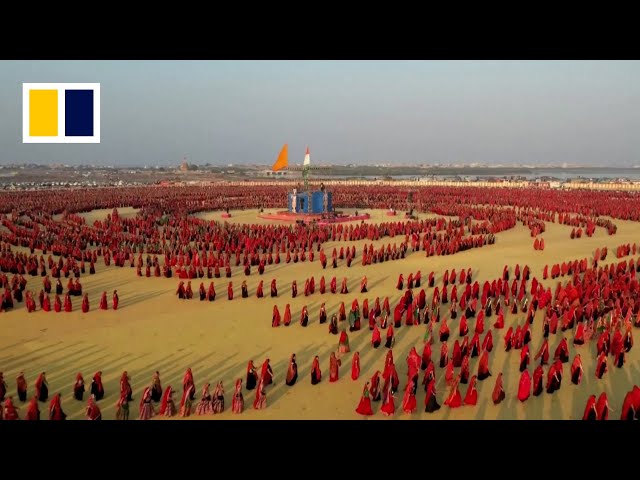 Indian women make massive human circles in traditional dance