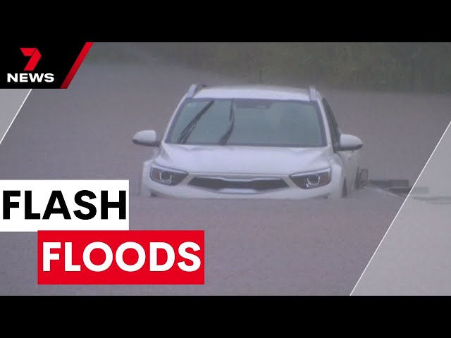 Heavy rain causes flash floods across Brisbane and the Redlands | 7NEWS