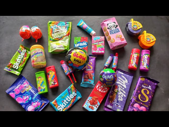 100 candies opening, chocolate a video, lots of chocolates, Cadbury celebration, surprise toys