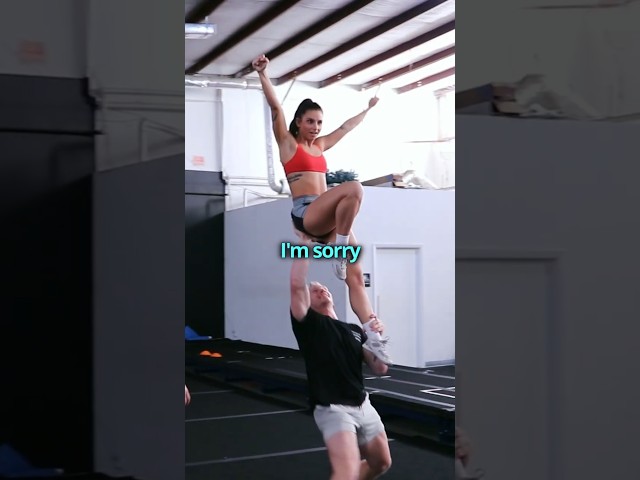 Unfortunate hand placement 💀 #cheer #stunt #shorts