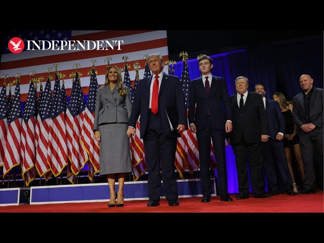 Trump joined by Melania, Baron and Trump children on stage at election party