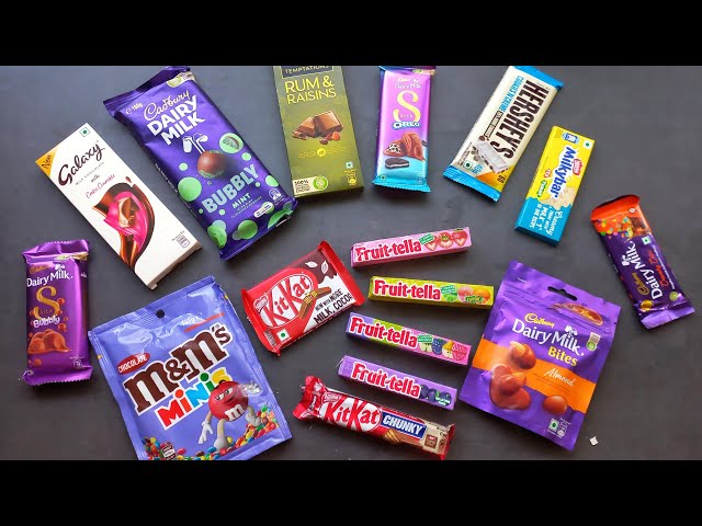 100 candies opening, chocolate a video, lots of chocolates, Cadbury celebration, surprise toys